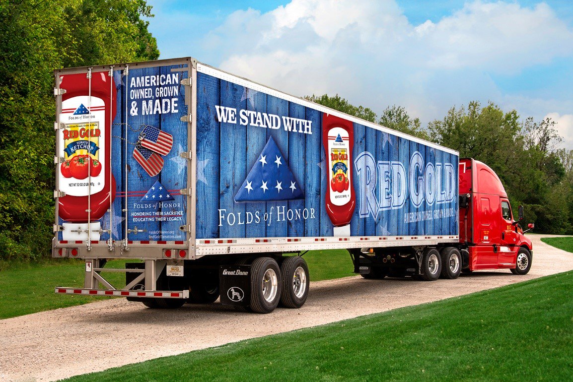 Truck decorated with Red Gold Folds of Honor designs