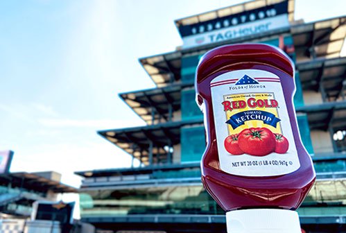 Image of Red Gold Folds of Honor Ketchup bottle in front of IMS Pagoda